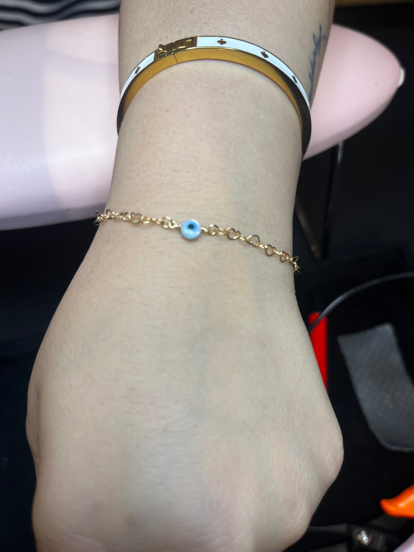 The finished permanent bracelet with a blue-eye connector